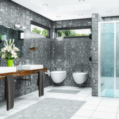 Modernes Badezimmer in weiß und schwarz mit Dusche, Badewanne, WC, Bidet und zwei Waschbecken mit einem großen Spiegel
